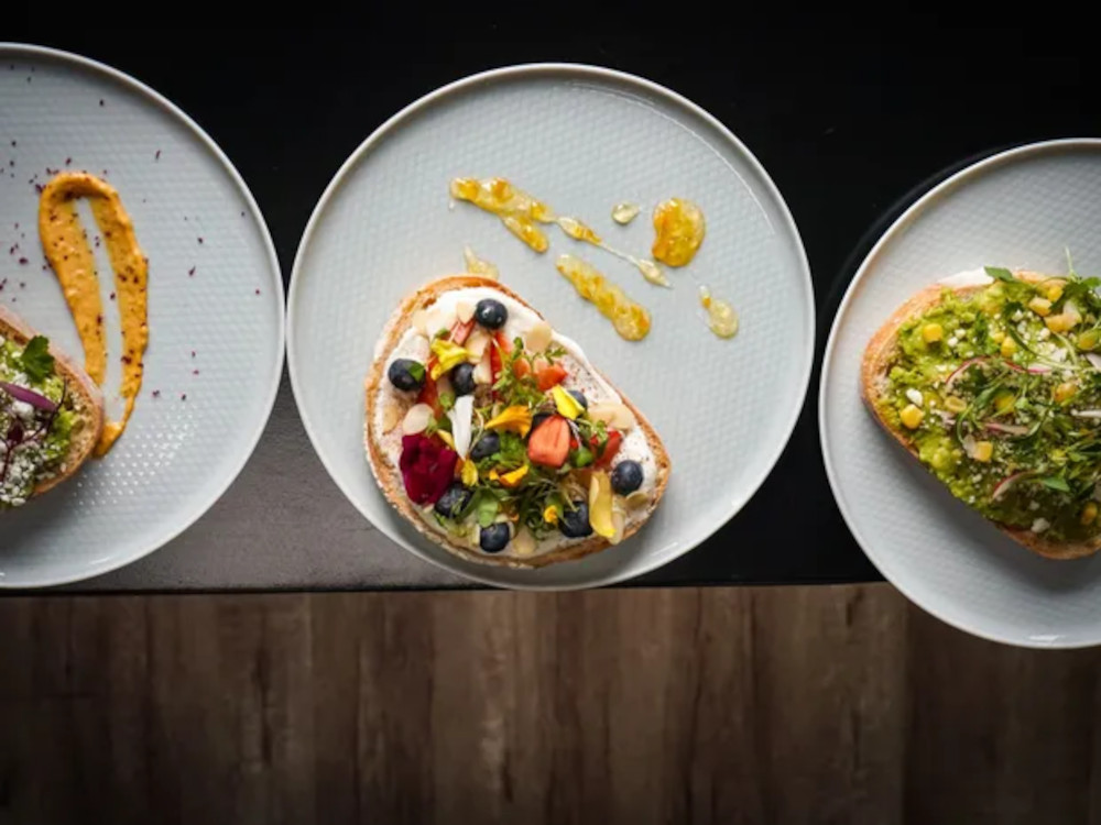 Plates with different dishes served, top view